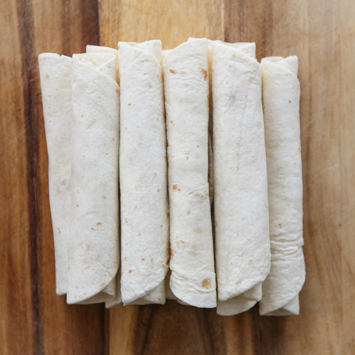taquitos rolled up and ready to bake